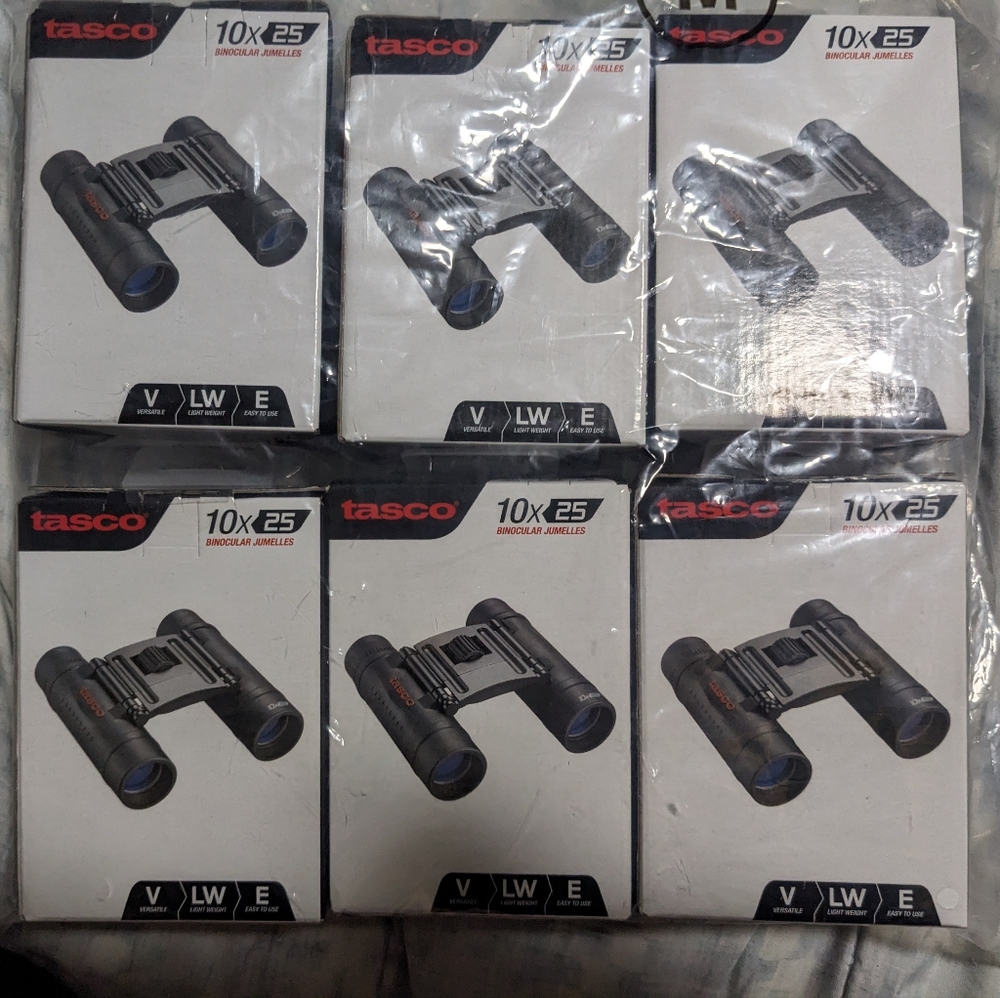 6 like new Tasco Binoculars. Price is for all.